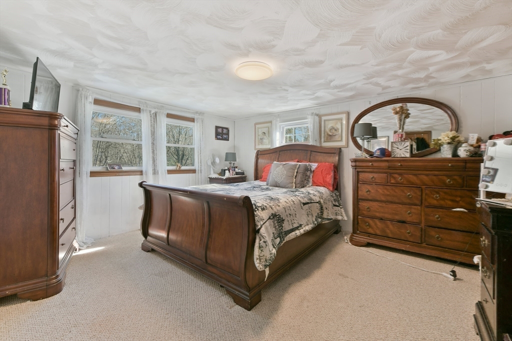 22 Stratford Road Natick, MA 01760 - Photo 26 of 41 a bedroom with a bed and a large window