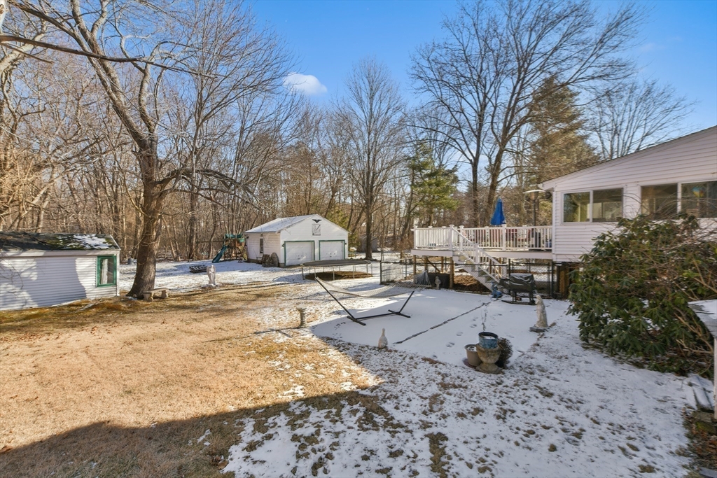 22 Stratford Road Natick, MA 01760 - Photo 32 of 41 a view of a yard with a house