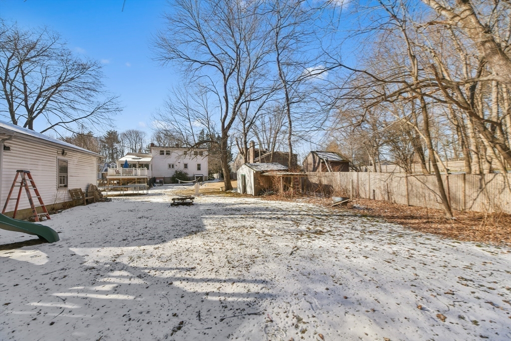 22 Stratford Road Natick, MA 01760 - Photo 33 of 41 a view of a yard with a snow
