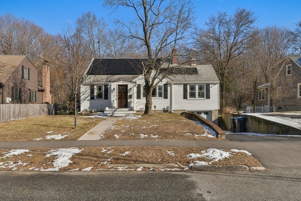 22 Stratford Road Natick, MA 01760 - Photo 4 of 41 a front view of a house with a yard