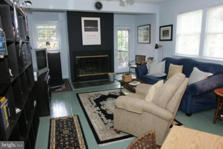 625 Deepdene Road Baltimore, MD 21210 - Photo 11 of 20 a living room with furniture and a fireplace