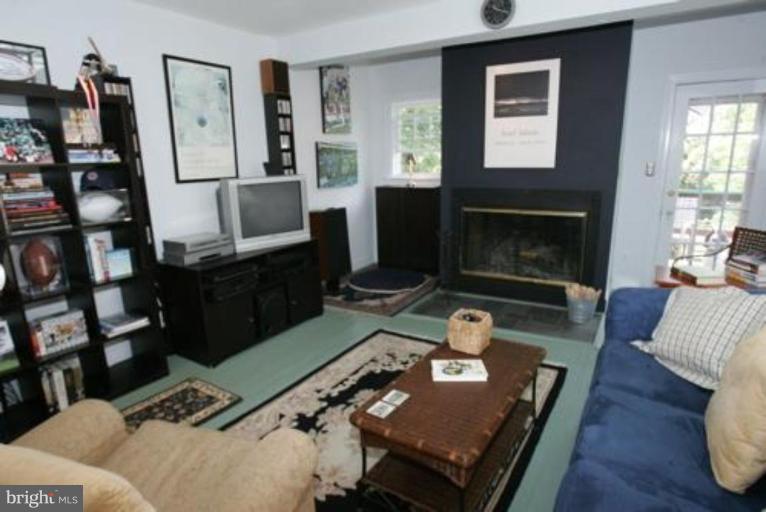 625 Deepdene Road Baltimore, MD 21210 - Photo 10 of 20 a living room with furniture fireplace and a window