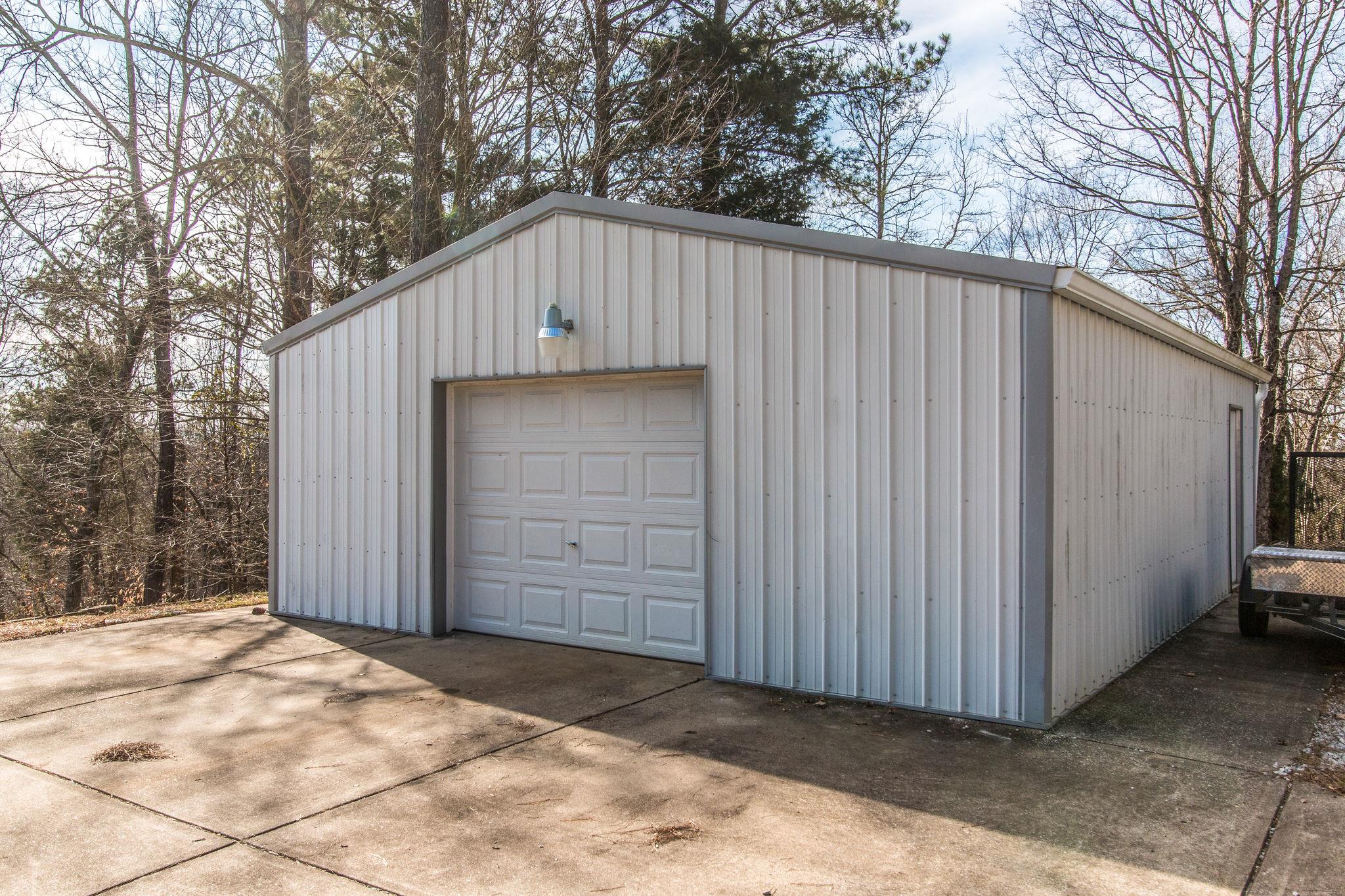 3957 Akin Ridge Road Williamsport, TN 38487 - Photo 4 of 28 Shop has propane heat and a 220V outlet, a storage/workroom room, and a partial loft for storage