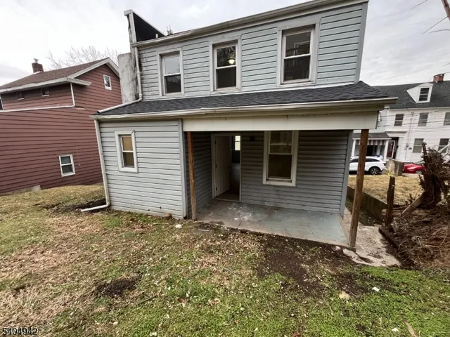 a front view of a house with a garage