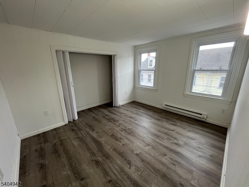 9 Randall Street Phillipsburg, NJ 08865 - Photo 10 of 13 a view of an empty room with wooden floor and a window
