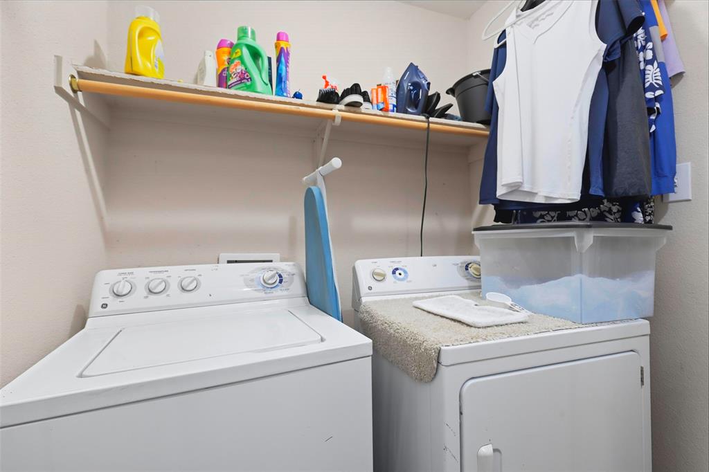 5200 Mountain Spring Trail Fort Worth, TX 76123 - Photo 9 of 23 a utility room with dryer and washer