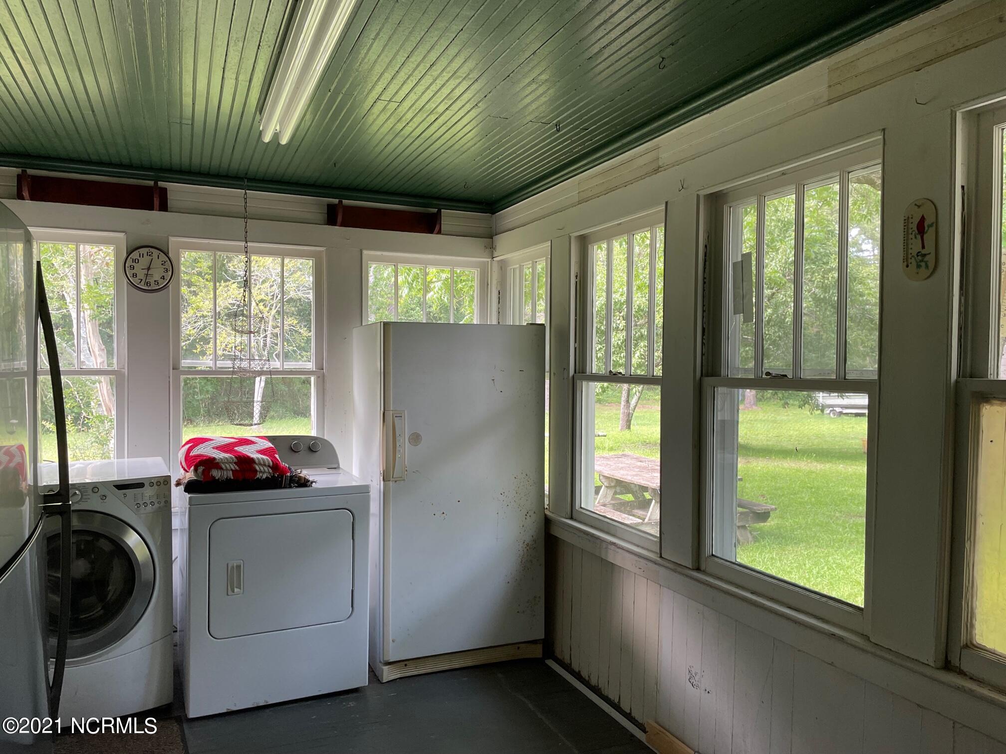 162 Smith Road Atlantic, NC 28511 - Photo 10 of 32 rear porch used for utilities