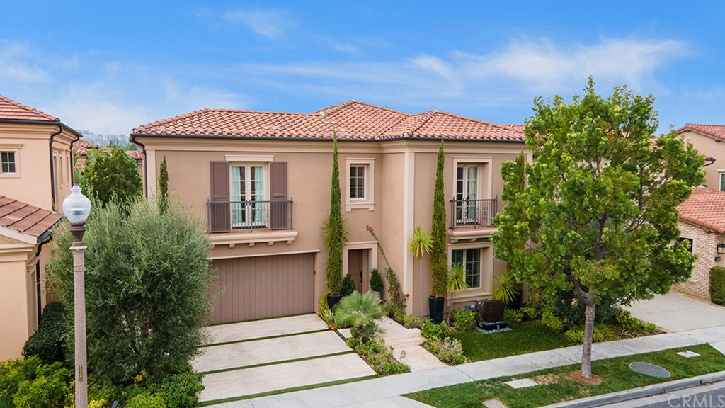 52 Umbria Irvine, CA 92618 - Photo 43 of 50 a front view of a house with a yard