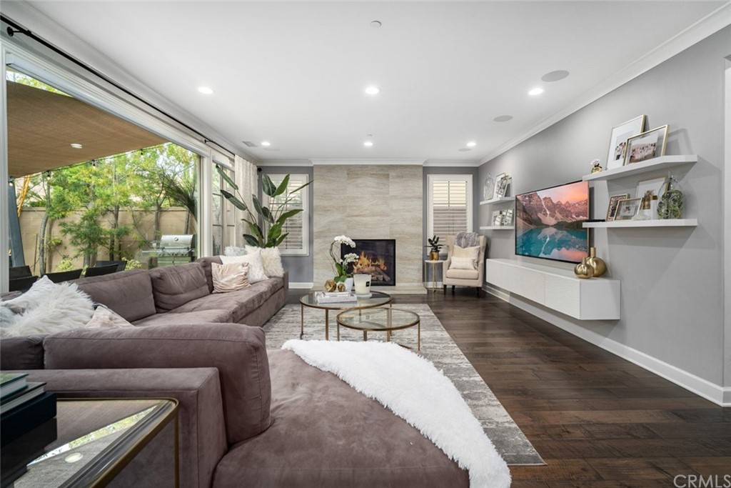 52 Umbria Irvine, CA 92618 - Photo 8 of 50 a living room with furniture and a fireplace