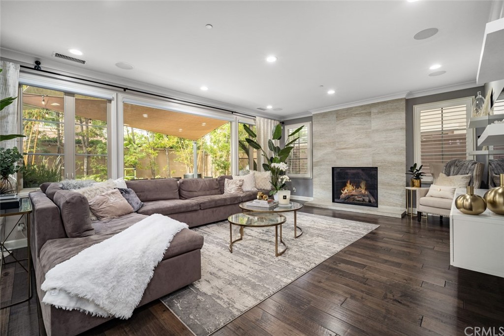 52 Umbria Irvine, CA 92618 - Photo 9 of 50 a living room with furniture and a fireplace