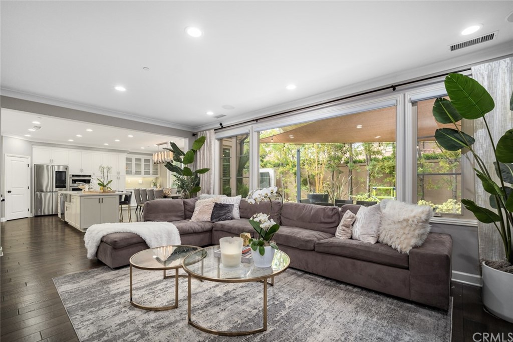52 Umbria Irvine, CA 92618 - Photo 10 of 50 a living room with furniture and a large window