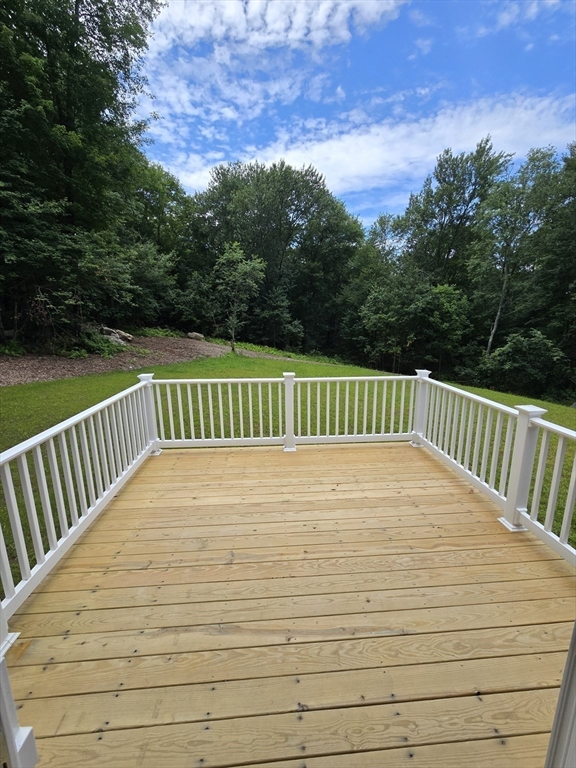 1242 Bemis Road Warren, MA 01083 - Photo 17 of 25 a view of balcony with wooden floor