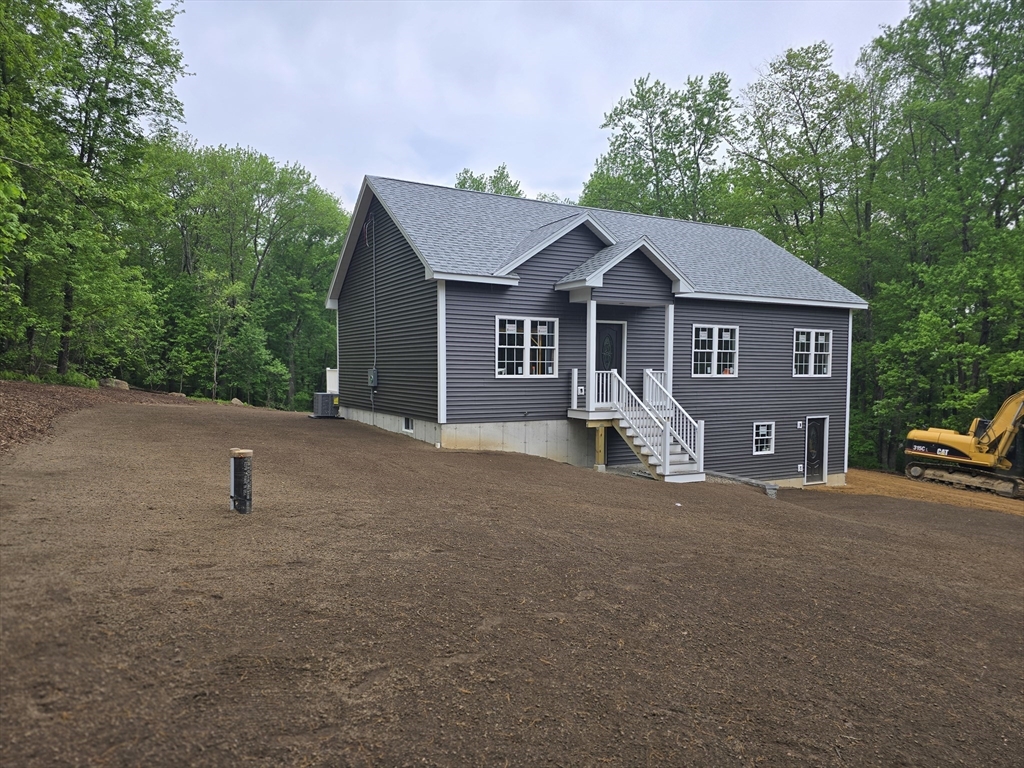 1242 Bemis Road Warren, MA 01083 - Photo 4 of 25 a house view with a outdoor space