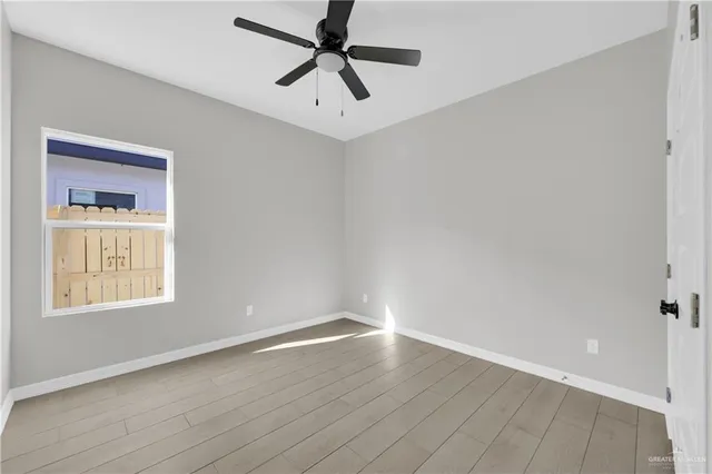 a bathroom with a bathtub shower sink and toilet