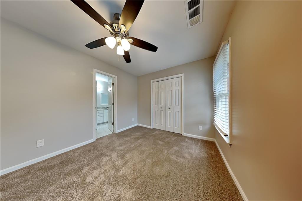 404 Rams Court Tucker, GA 30084 - Photo 12 of 21 a view of an empty room with a window