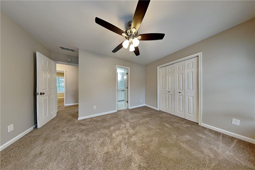 404 Rams Court Tucker, GA 30084 - Photo 13 of 21 a view of an empty room and window