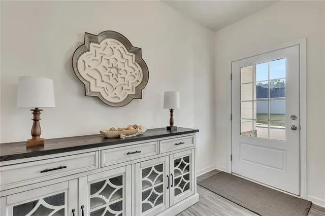 a table with a vase and a vase on it