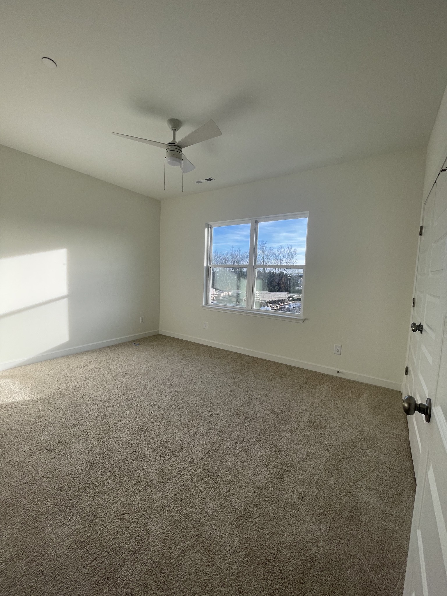 153 Bess Boulevard Spring Hill, TN 37174 - Photo 18 of 22 an empty room with a empty space and windows