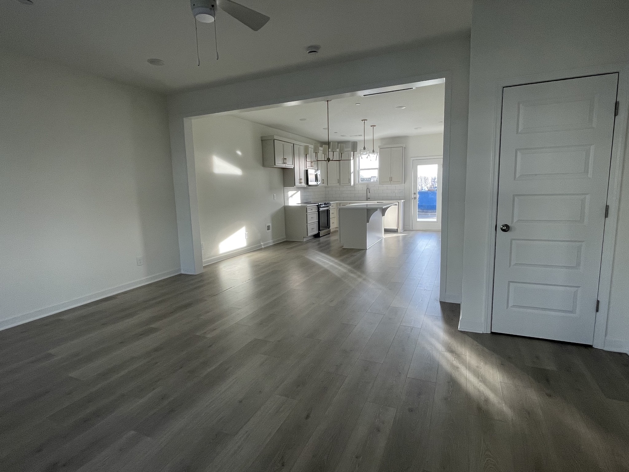 153 Bess Boulevard Spring Hill, TN 37174 - Photo 6 of 22 a view of empty room with wooden floor