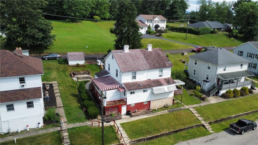178 Locust Street Muse, PA 15350 - Photo 2 of 28 an aerial view of multiple houses with yard