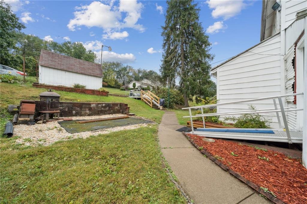 178 Locust Street Muse, PA 15350 - Photo 10 of 28 a view of swimming pool with a yard