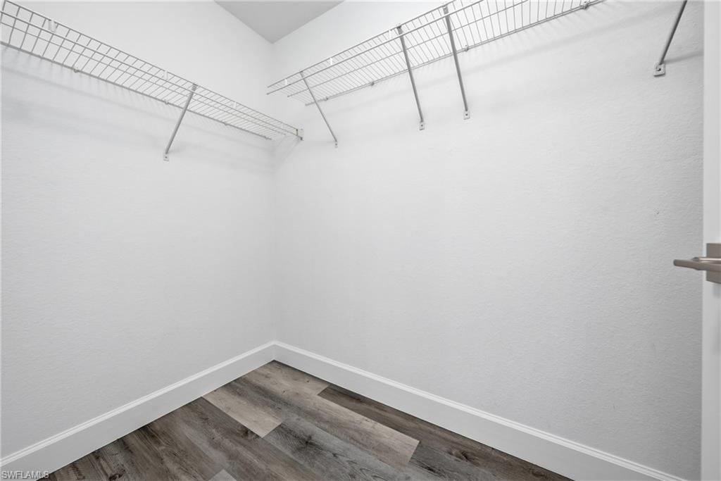 4621 25th Street Southwest Lehigh Acres, FL 33973 - Photo 22 of 41 a view of a room with racks on the wall