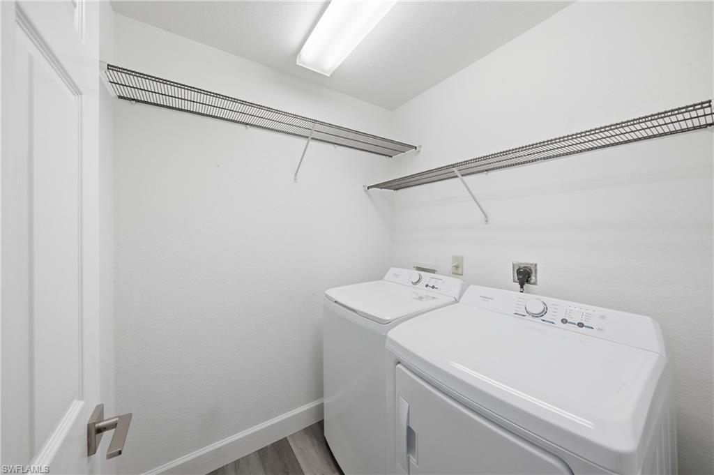 4621 25th Street Southwest Lehigh Acres, FL 33973 - Photo 26 of 41 a utility room with dryer and washer