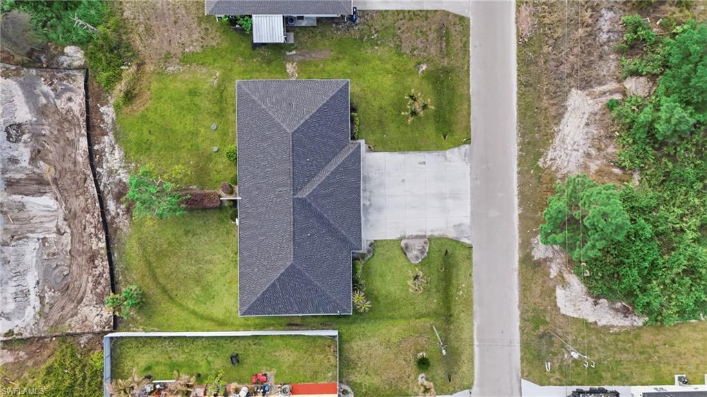 4621 25th Street Southwest Lehigh Acres, FL 33973 - Photo 36 of 41 an aerial view of a house
