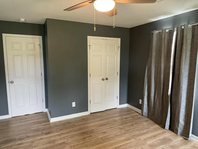 a view of entryway with wooden floor