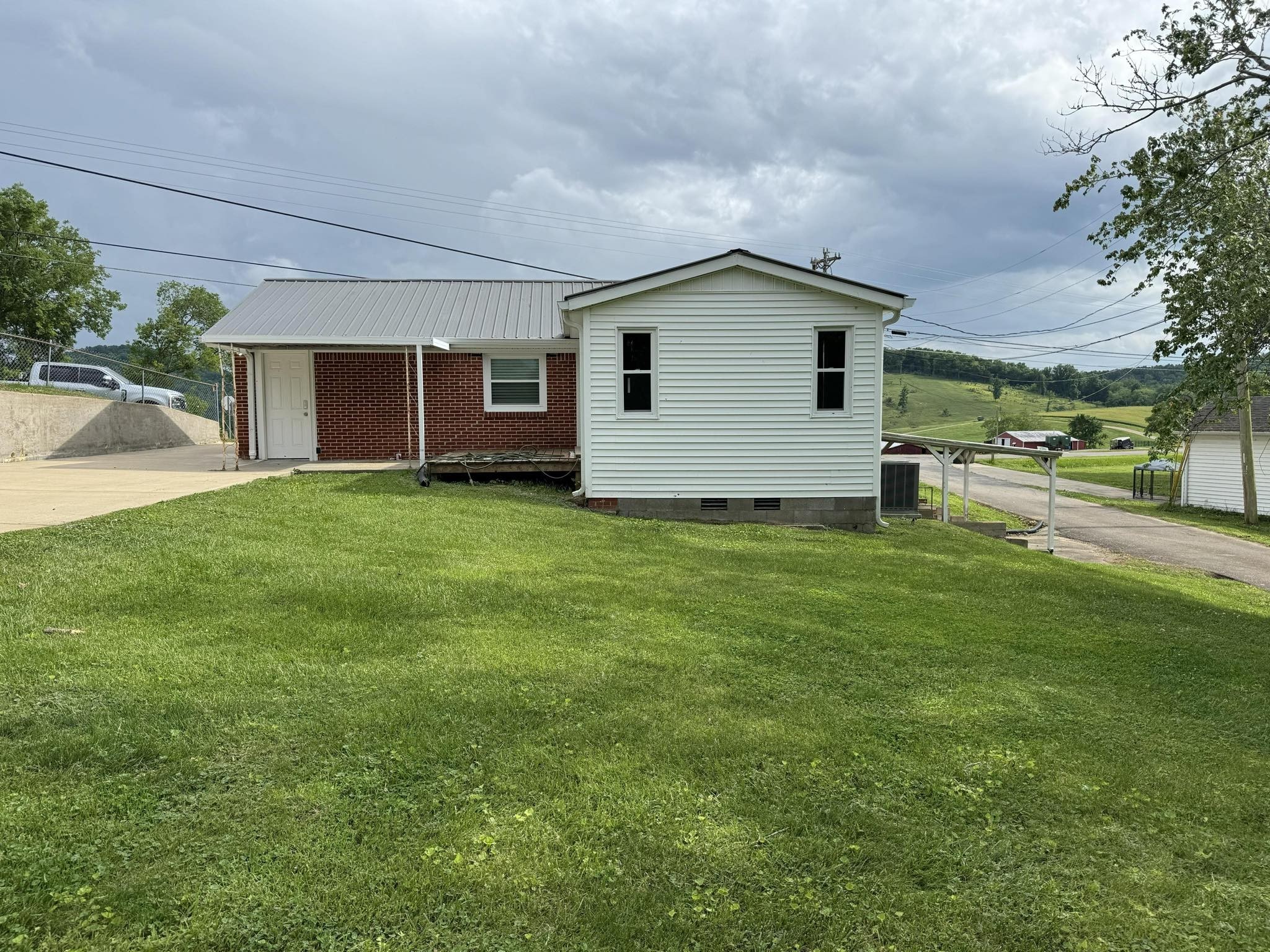 166 Old Lebanon Road Carthage, TN 37030 - Photo 5 of 25 a house view with a garden space
