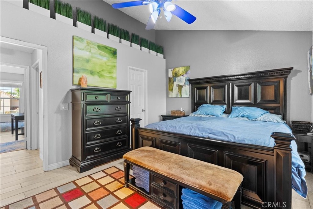 6433 Aleatico Place Rancho Cucamonga, CA 91737 - Photo 18 of 39 a bedroom with a bed and a dresser