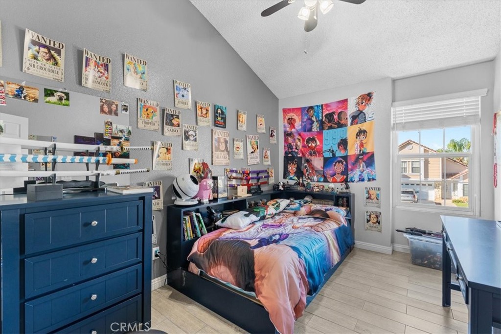 6433 Aleatico Place Rancho Cucamonga, CA 91737 - Photo 21 of 39 a bed room with a bed and a desk