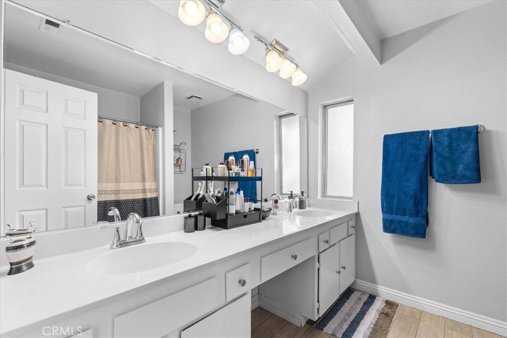 6433 Aleatico Place Rancho Cucamonga, CA 91737 - Photo 23 of 39 a kitchen with a sink cabinets and window