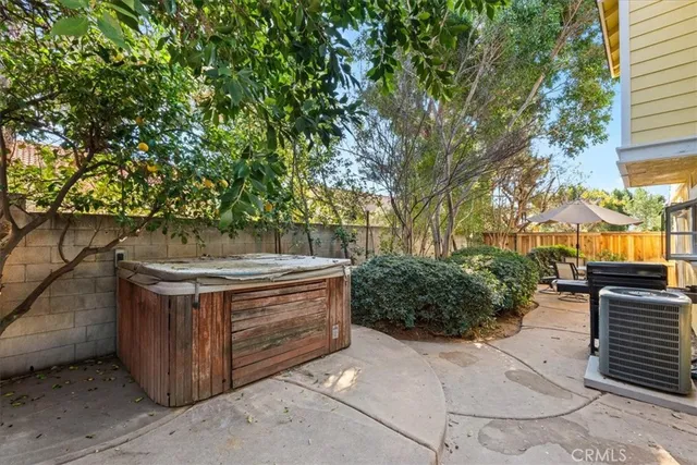 a view of a garden with an outdoor seating