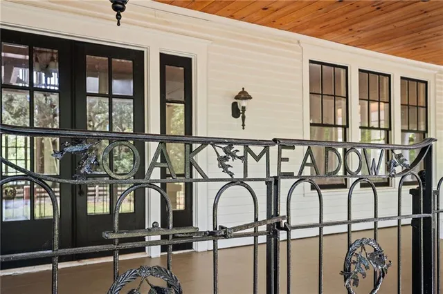 a view of a balcony with wooden floor