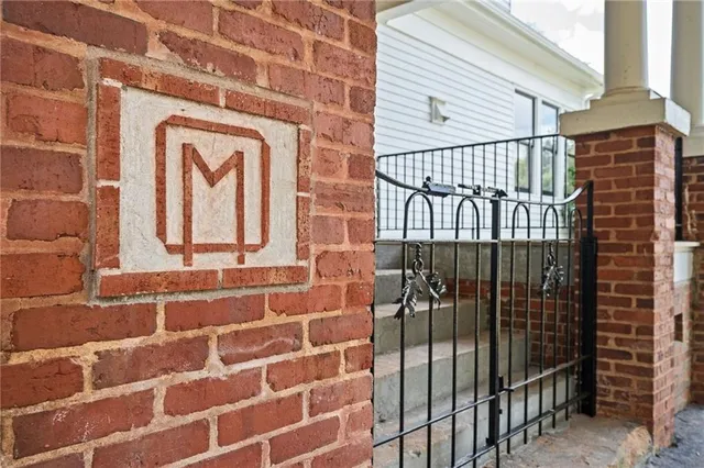a view of an entryway with wooden floor and stairs