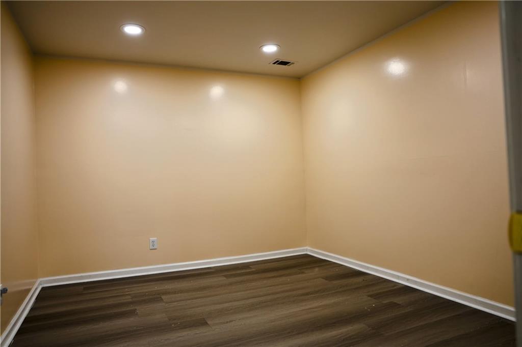 4296 Linda Lane Southwest Lilburn, GA 30047 - Photo 13 of 29 a view of room with wooden floor