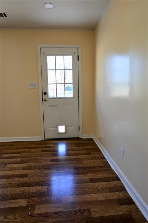 4296 Linda Lane Southwest Lilburn, GA 30047 - Photo 15 of 29 a view of empty room with wooden floor
