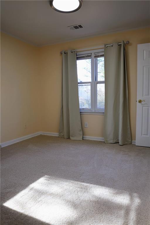 4296 Linda Lane Southwest Lilburn, GA 30047 - Photo 24 of 29 an empty room with windows