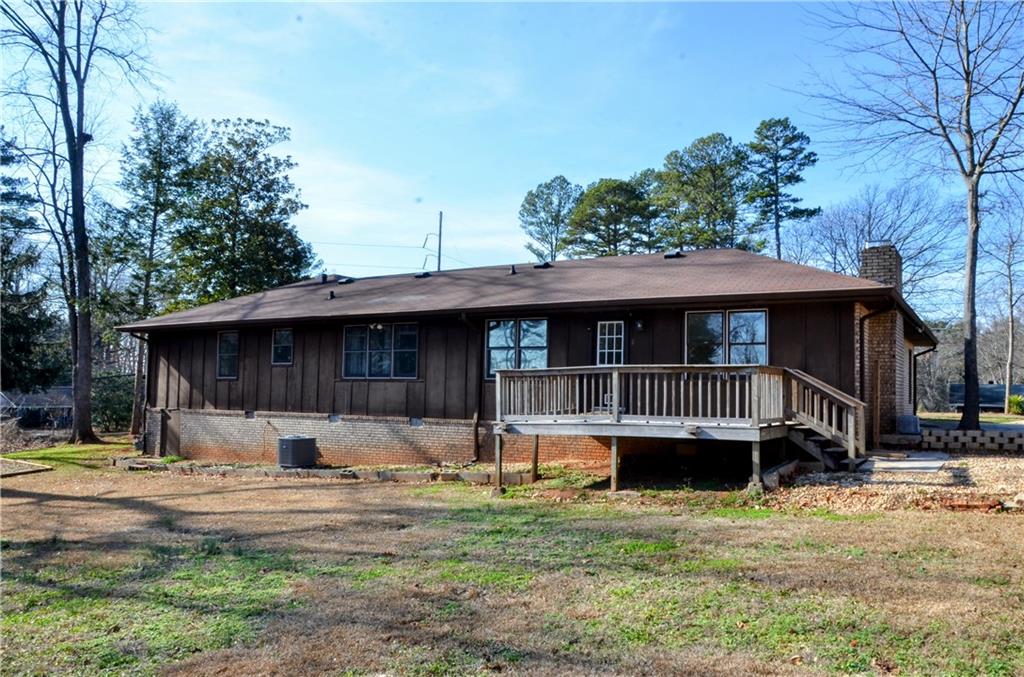 4296 Linda Lane Southwest Lilburn, GA 30047 - Photo 27 of 29 a view of a house with a yard