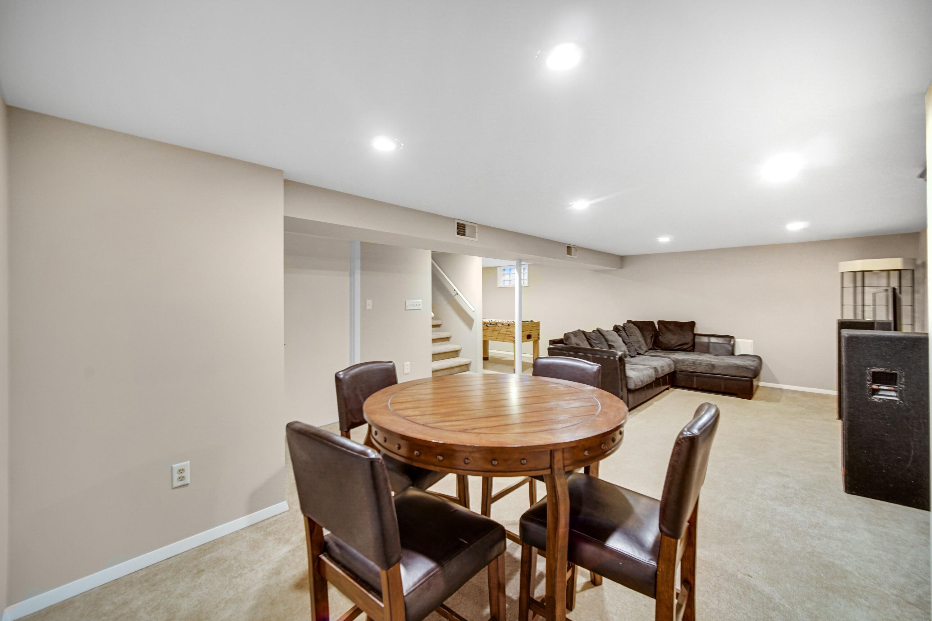 9418 Cleveland Street Crown Point, IN 46307 - Photo 16 of 22 a view of a dining room with furniture