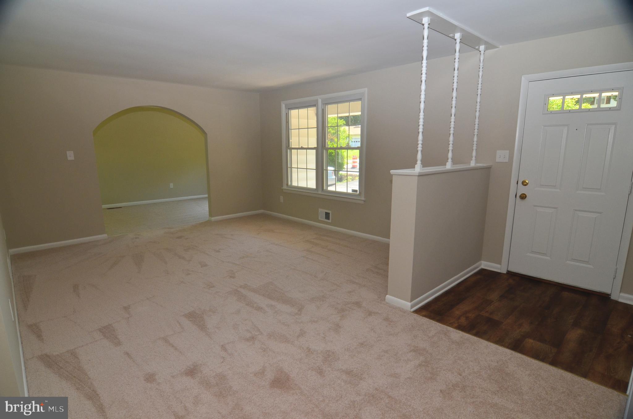 8604 Contee Road Laurel, MD 20708 - Photo 2 of 56 an empty room with windows