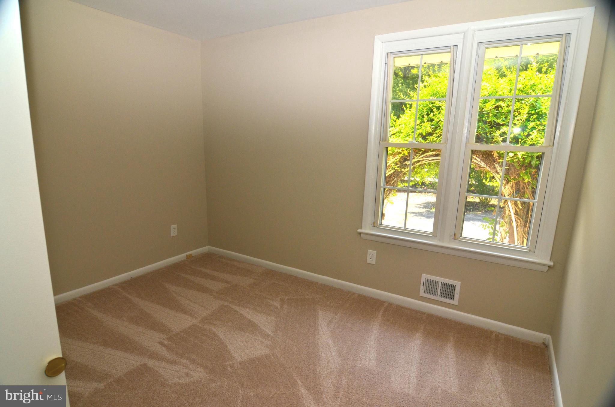 8604 Contee Road Laurel, MD 20708 - Photo 24 of 56 an empty room with a window