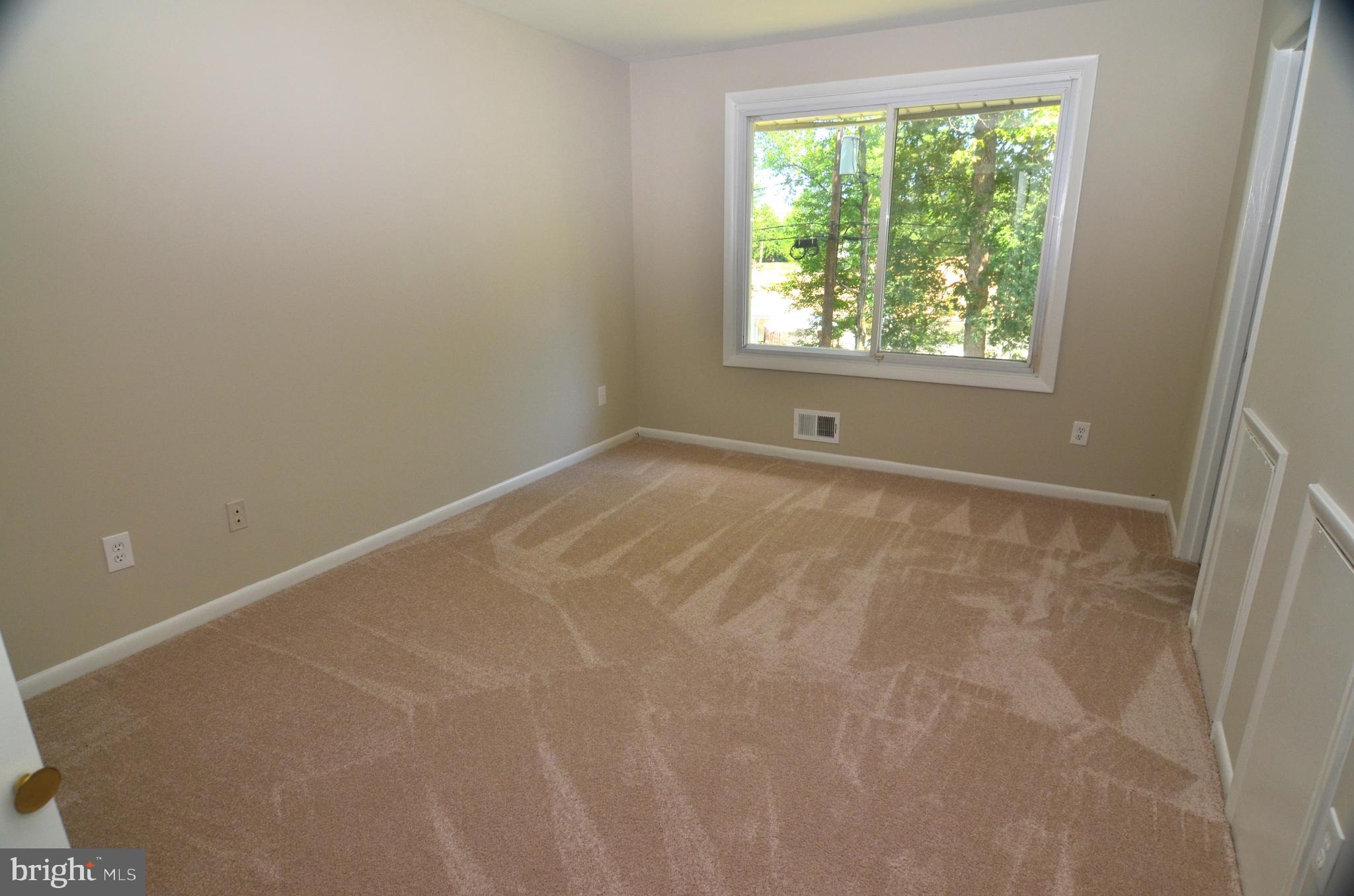 8604 Contee Road Laurel, MD 20708 - Photo 26 of 56 a view of an empty room with a window