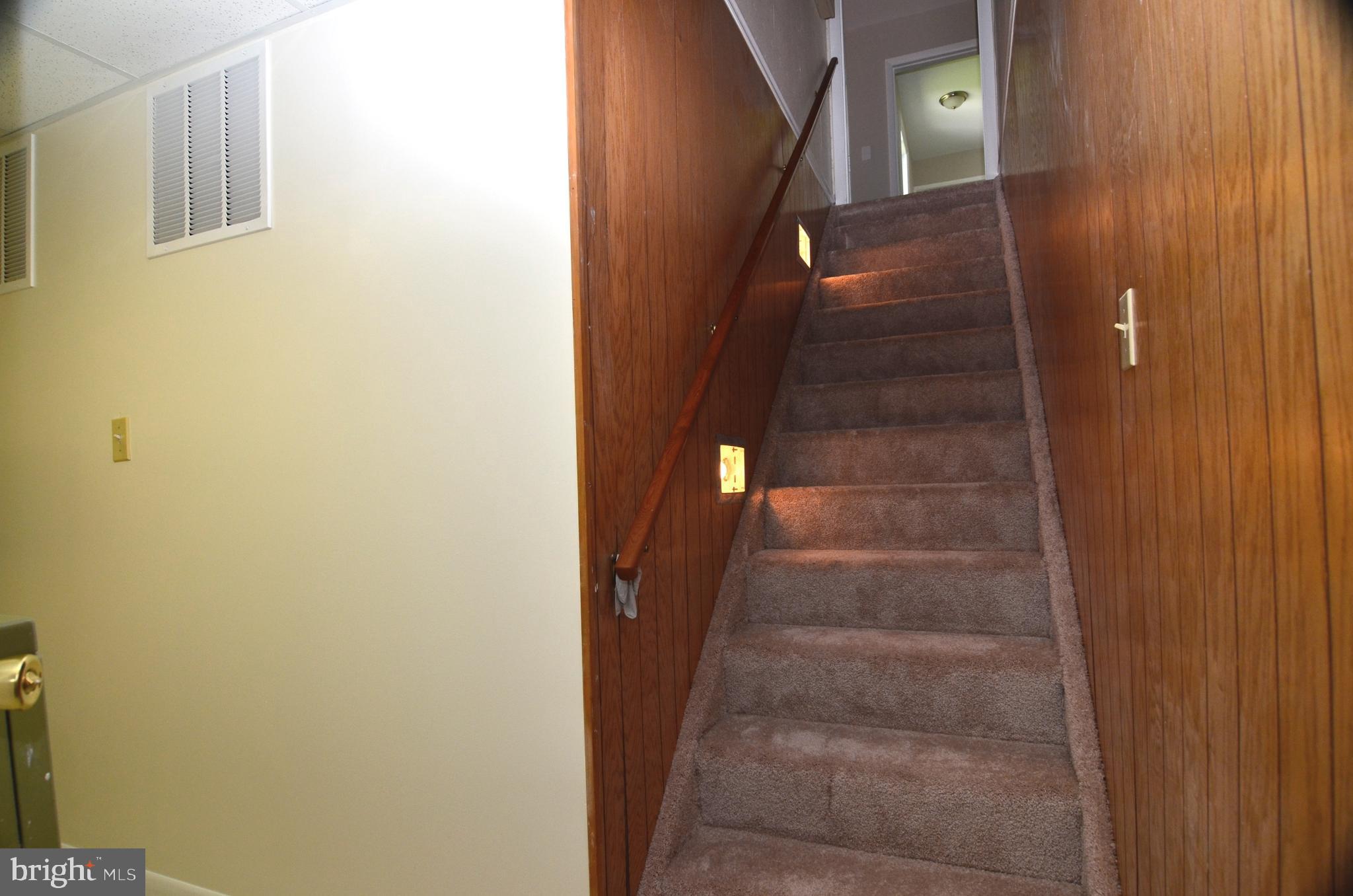 8604 Contee Road Laurel, MD 20708 - Photo 29 of 56 a view of staircase with white walls