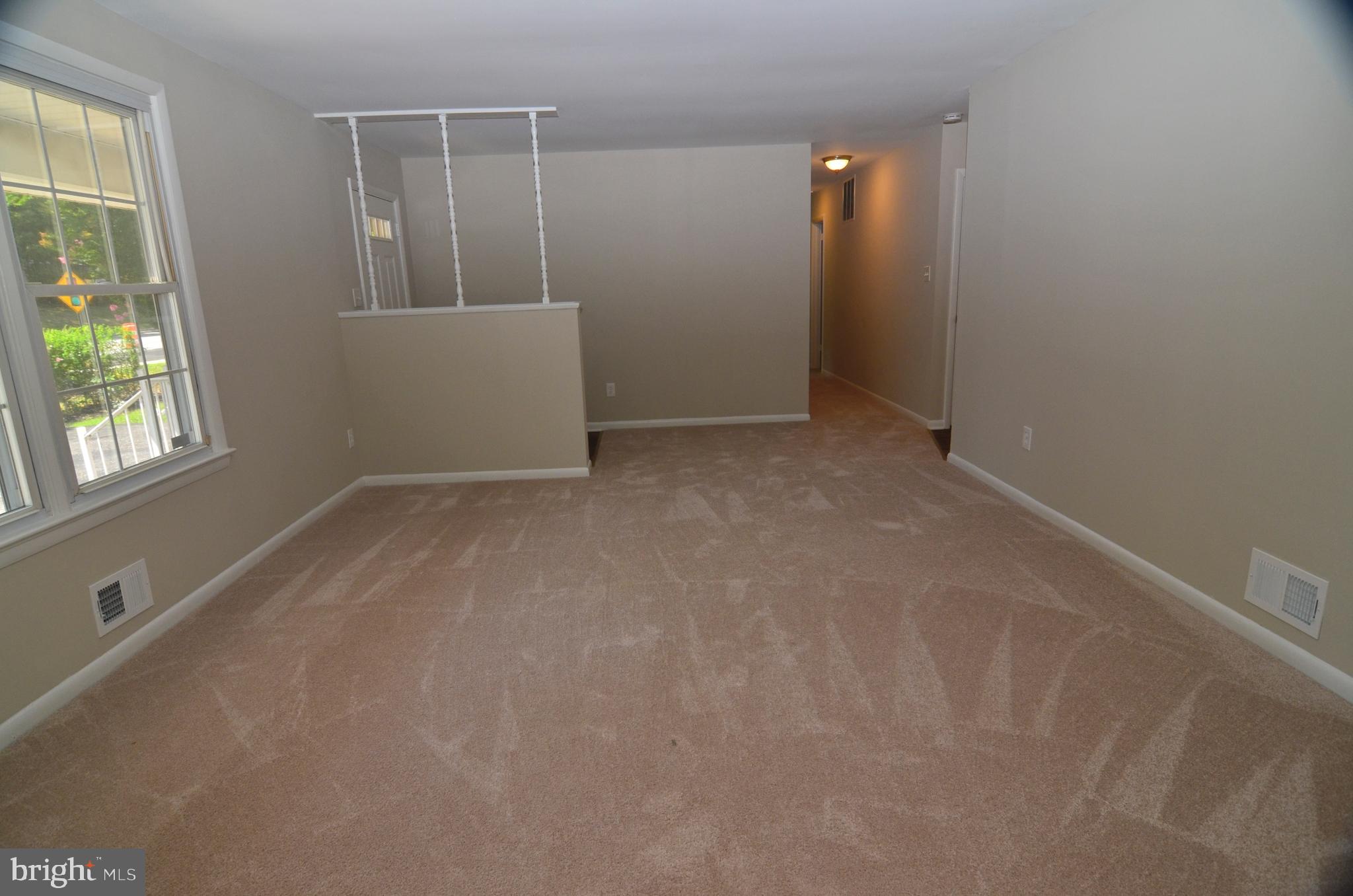 8604 Contee Road Laurel, MD 20708 - Photo 4 of 56 an empty room with windows