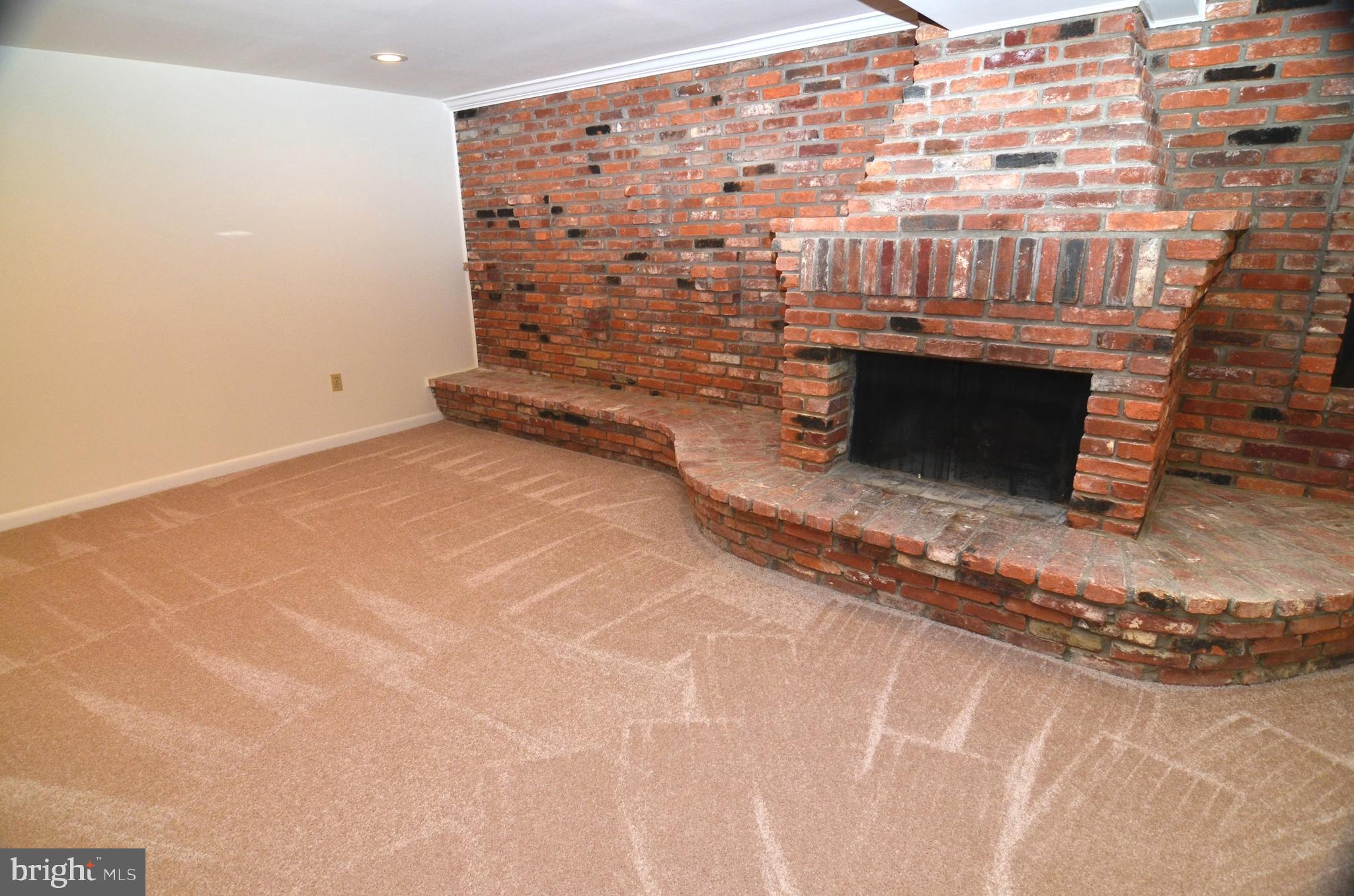 8604 Contee Road Laurel, MD 20708 - Photo 34 of 56 a view of fireplace and wooden floor