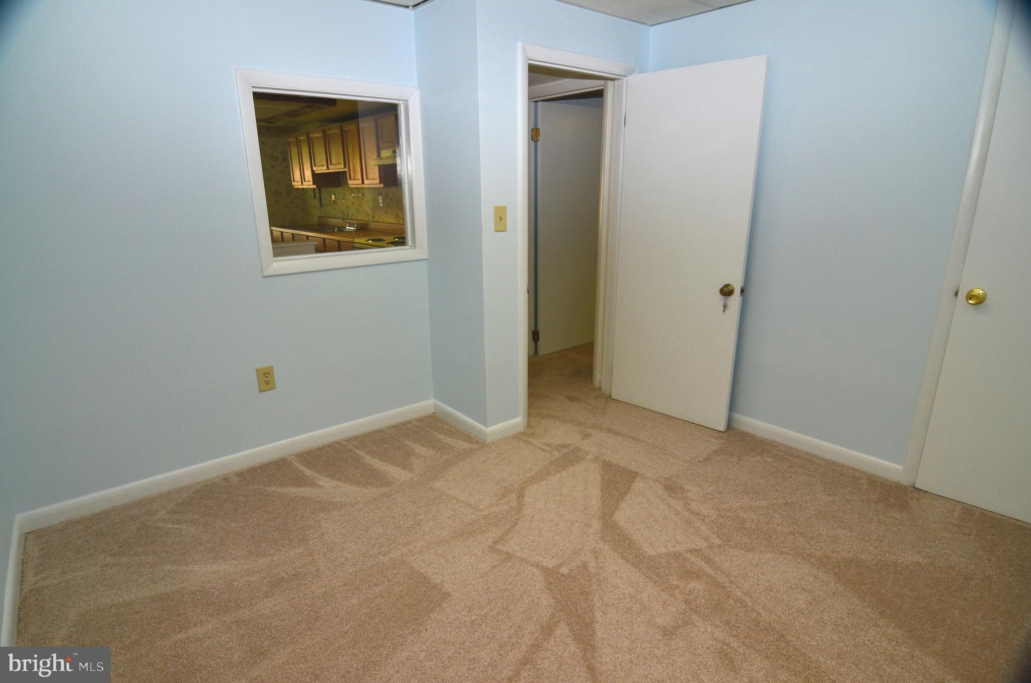 8604 Contee Road Laurel, MD 20708 - Photo 44 of 56 a view of an empty room with a window