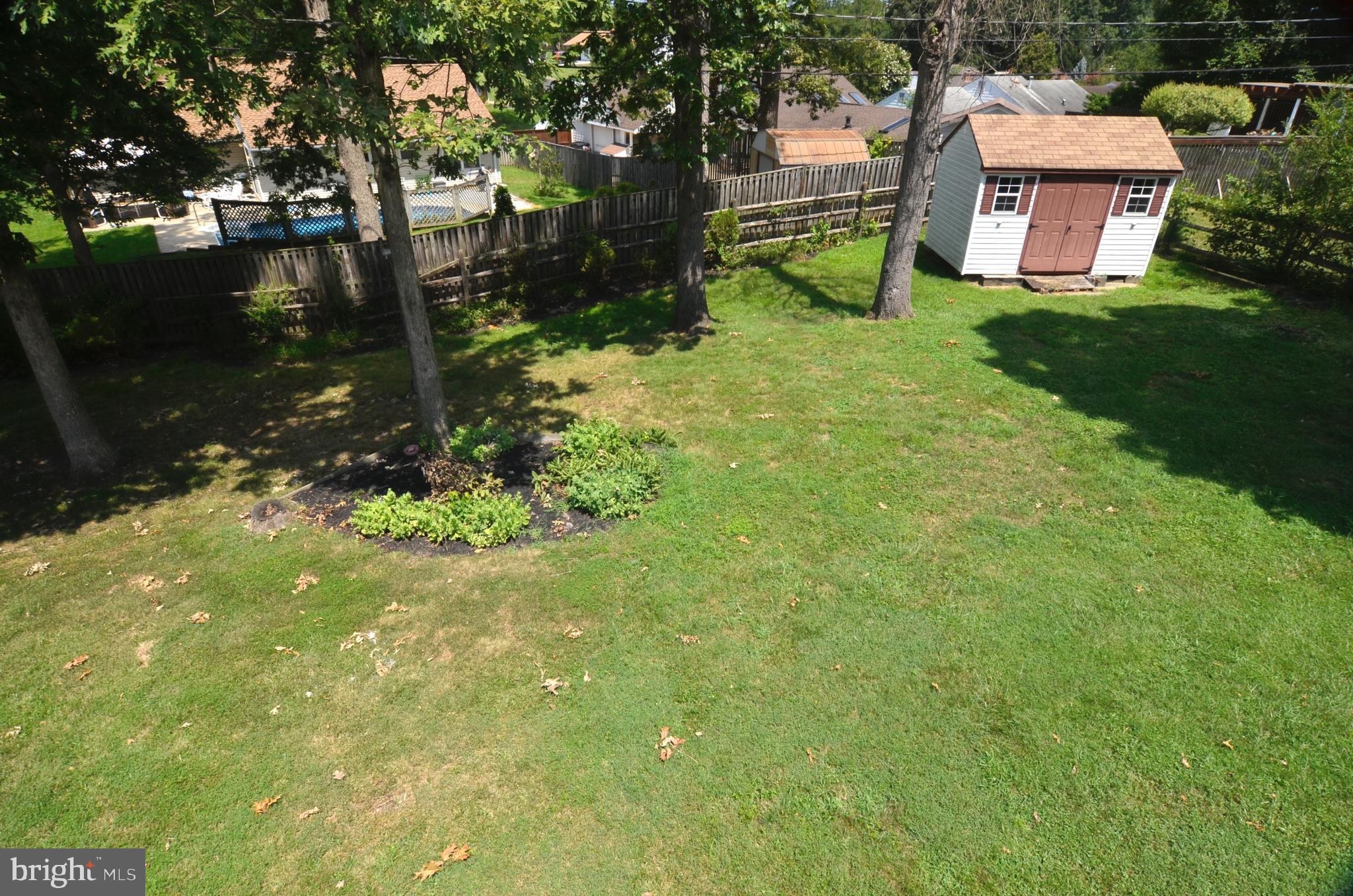 8604 Contee Road Laurel, MD 20708 - Photo 50 of 56 a green field covered with tall trees