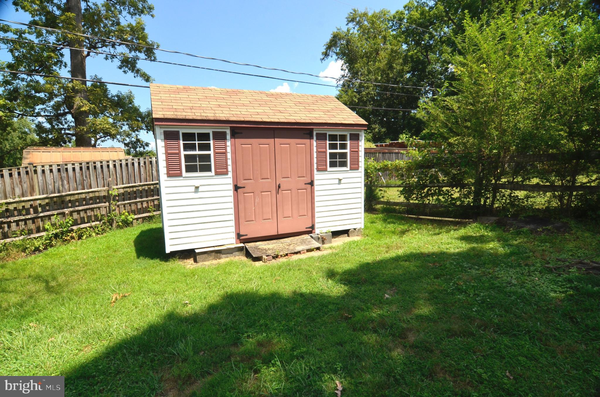 8604 Contee Road Laurel, MD 20708 - Photo 52 of 56 a view of a house with a backyard